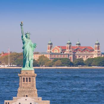 Annie Moore becomes the first immigrant to enter Ellis Island in 1892.