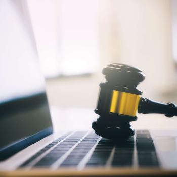 Copyright Law: From Digital Reprints to Downloads